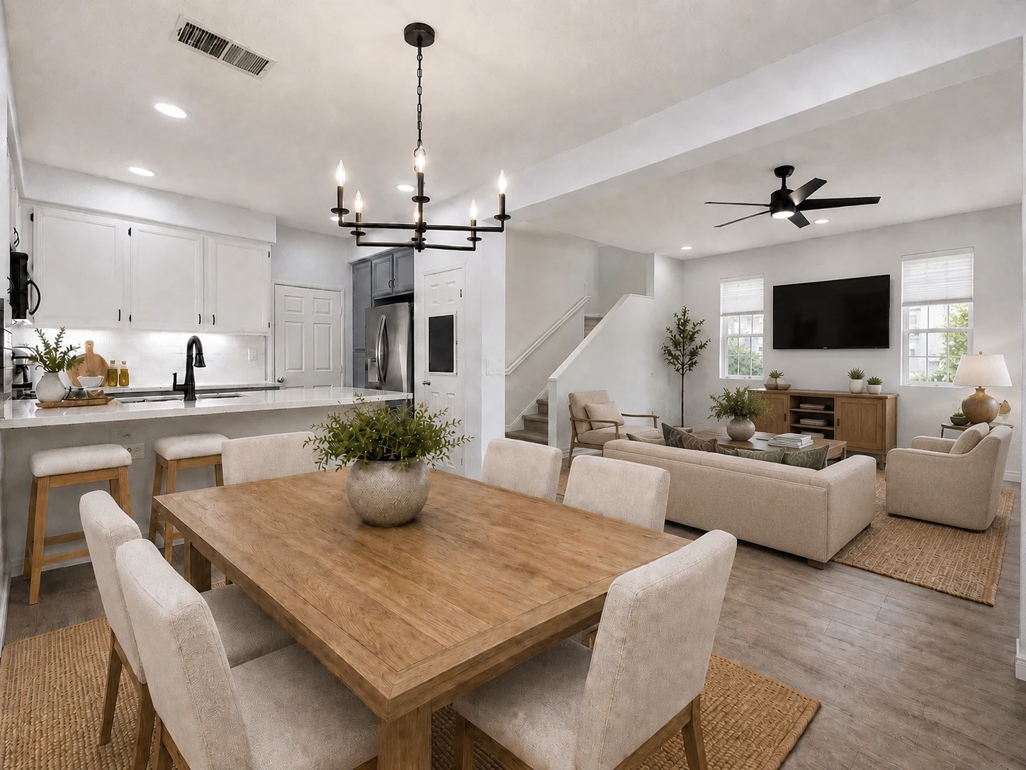 Concept rendering showing the dining room, kitchen, and living room connected by a wider open span